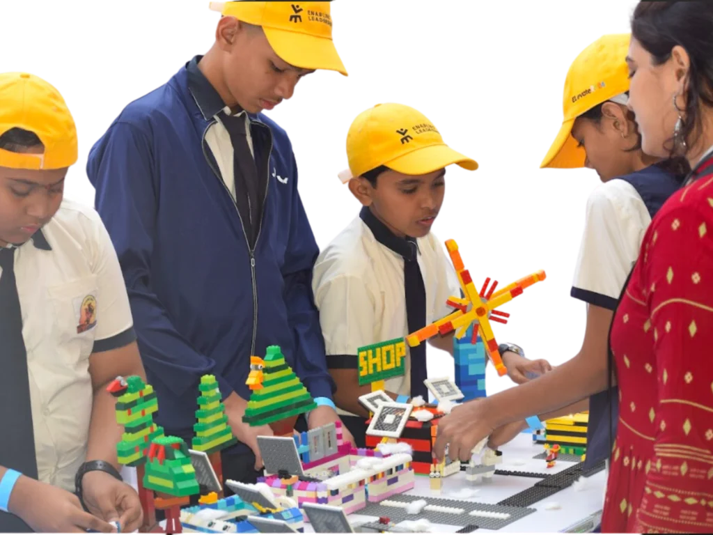 Children being mentored during their LEGO showcase session